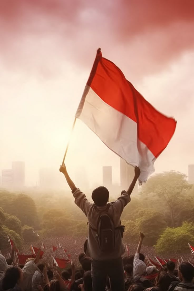 Masyarakat Indonesia merayakan kemerdekaan dengan bendera merah putih